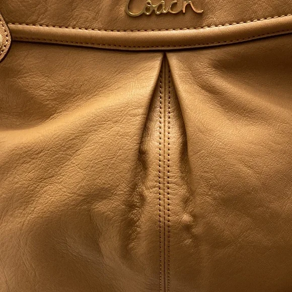 This is a coach leather bag with a shoulder strap and a carry handle - Picture 2 of 6